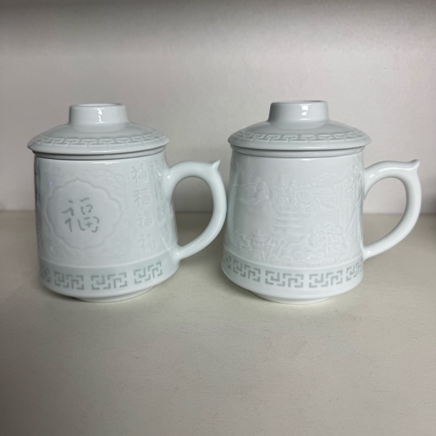 高温雕刻玲珑带盖茶水分离陶瓷茶杯泡茶杯家用办公送礼佳选