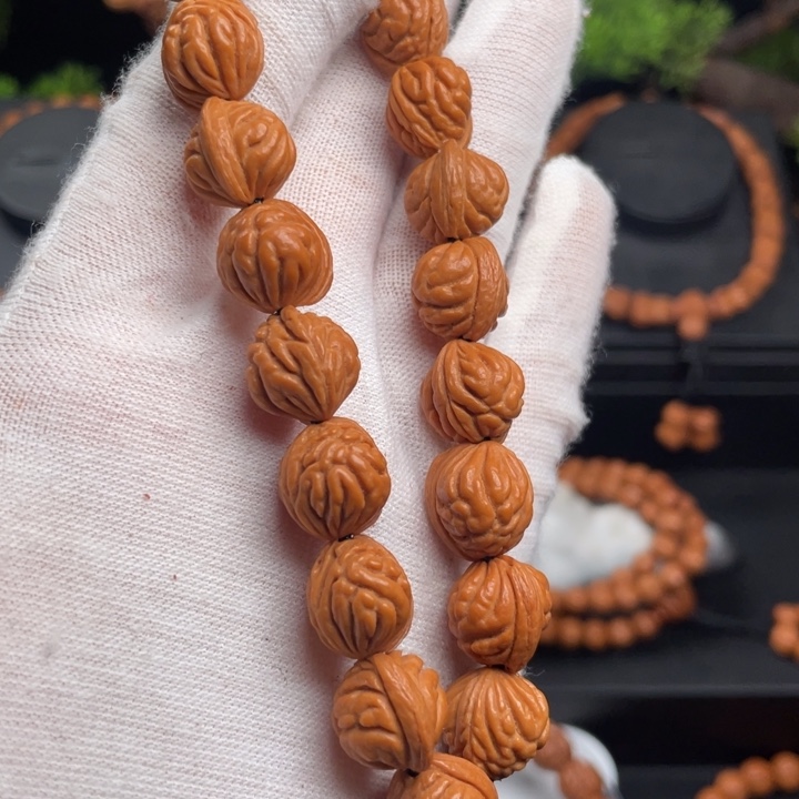 黑***人木质类精品桃核手持