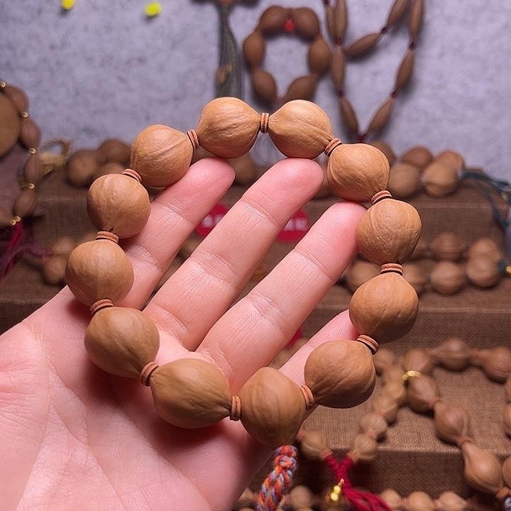 心***.橄榄核手串正圆19.22