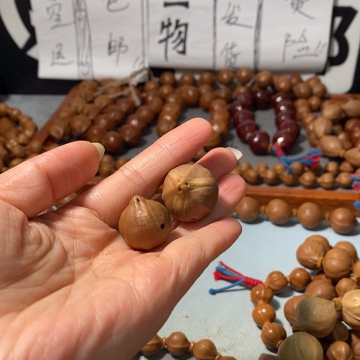 洪***波橄榄核手串19-22精品3通