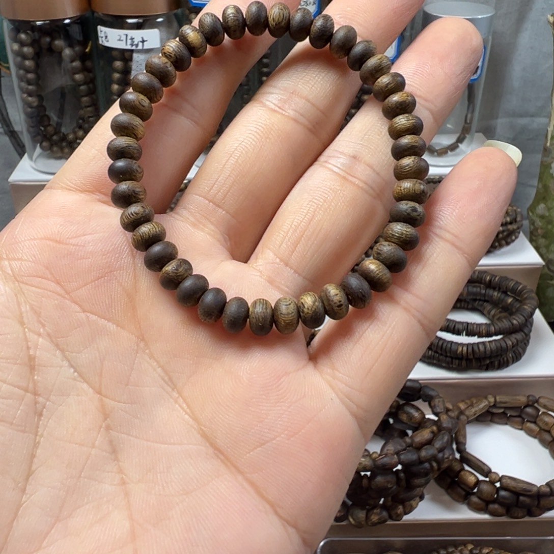 沉香碎屑沉香奇楠沉香卡6单圈算盘