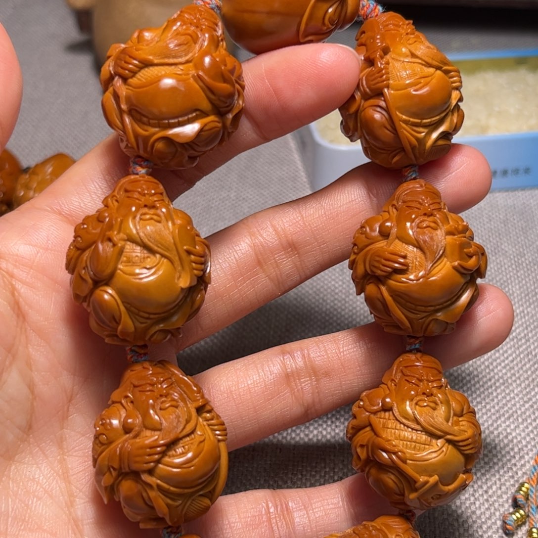 橄榄核吊坠忠义千秋