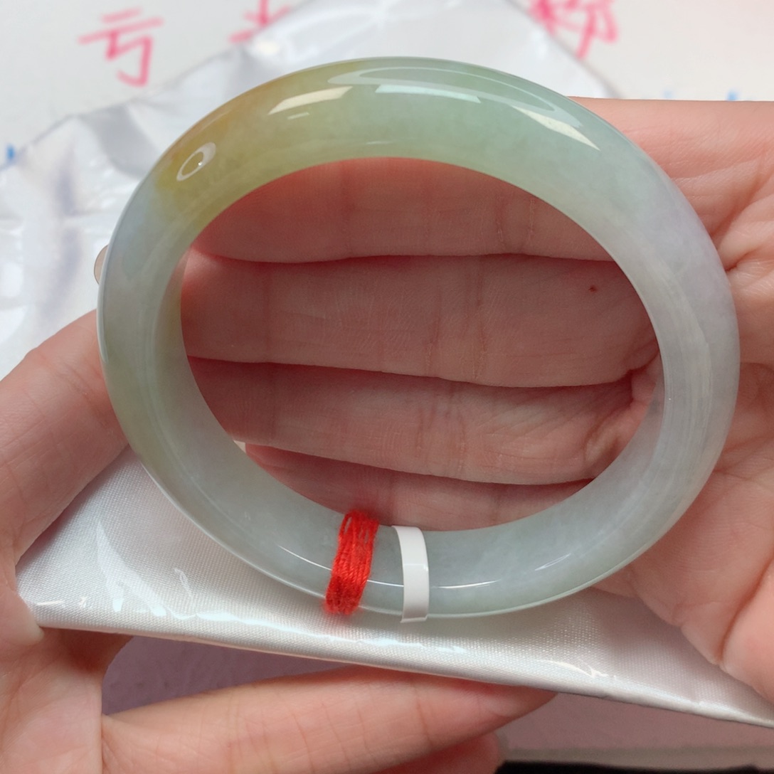 翡翠手镯未镶嵌56.6圈 茶绿底飘抹黄翡