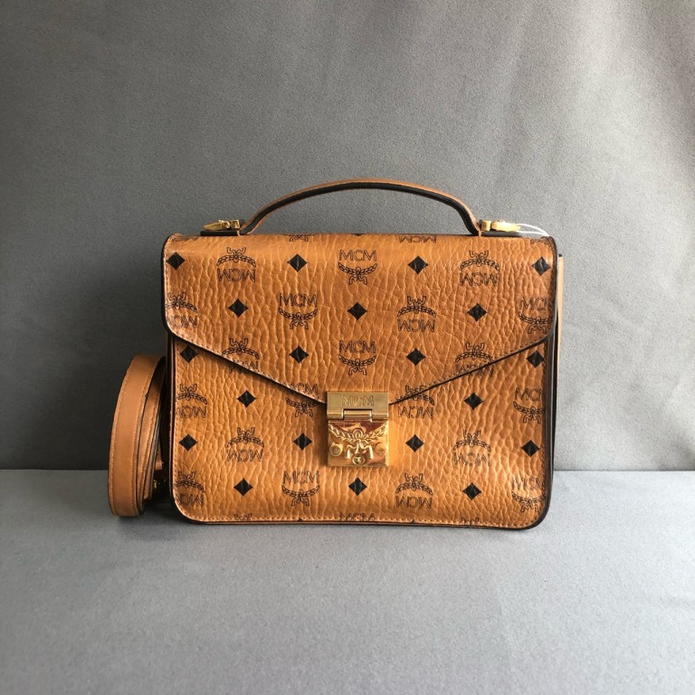 95新 MCM 拾锦奢品 MCM经典印花邮差单肩包