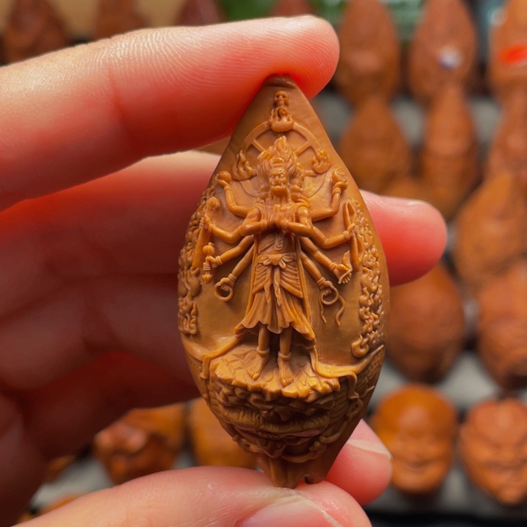 橄榄核吊坠纯手工雕刻