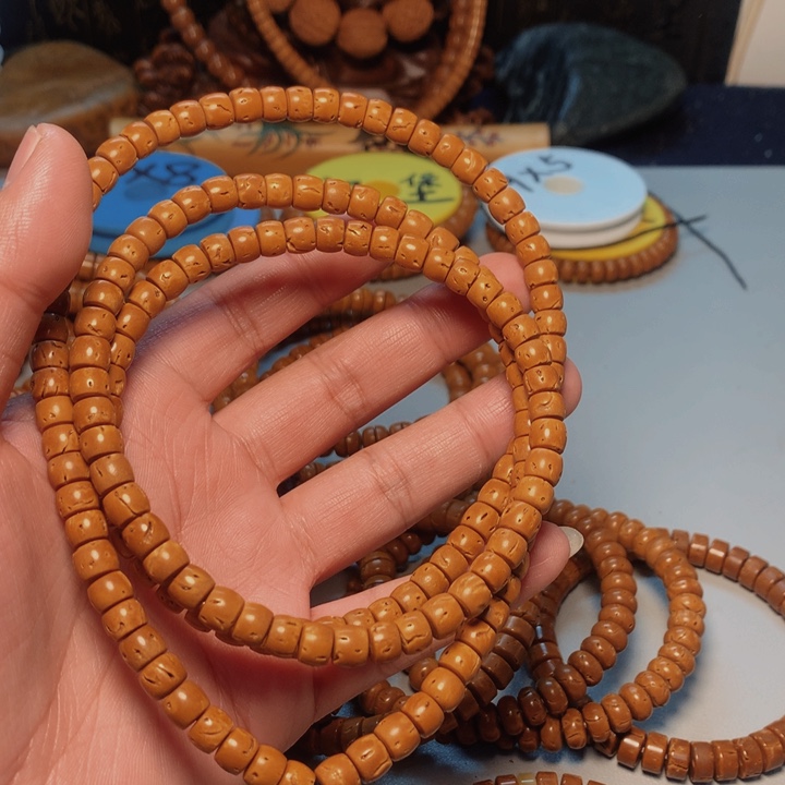 桃核吊坠换**字桃核手串