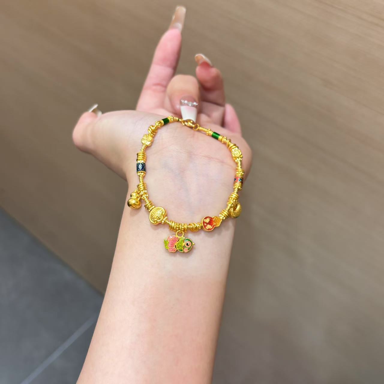 【菠萝珠宝】足金999 年年有余 招财进宝手链 金重：22.63克