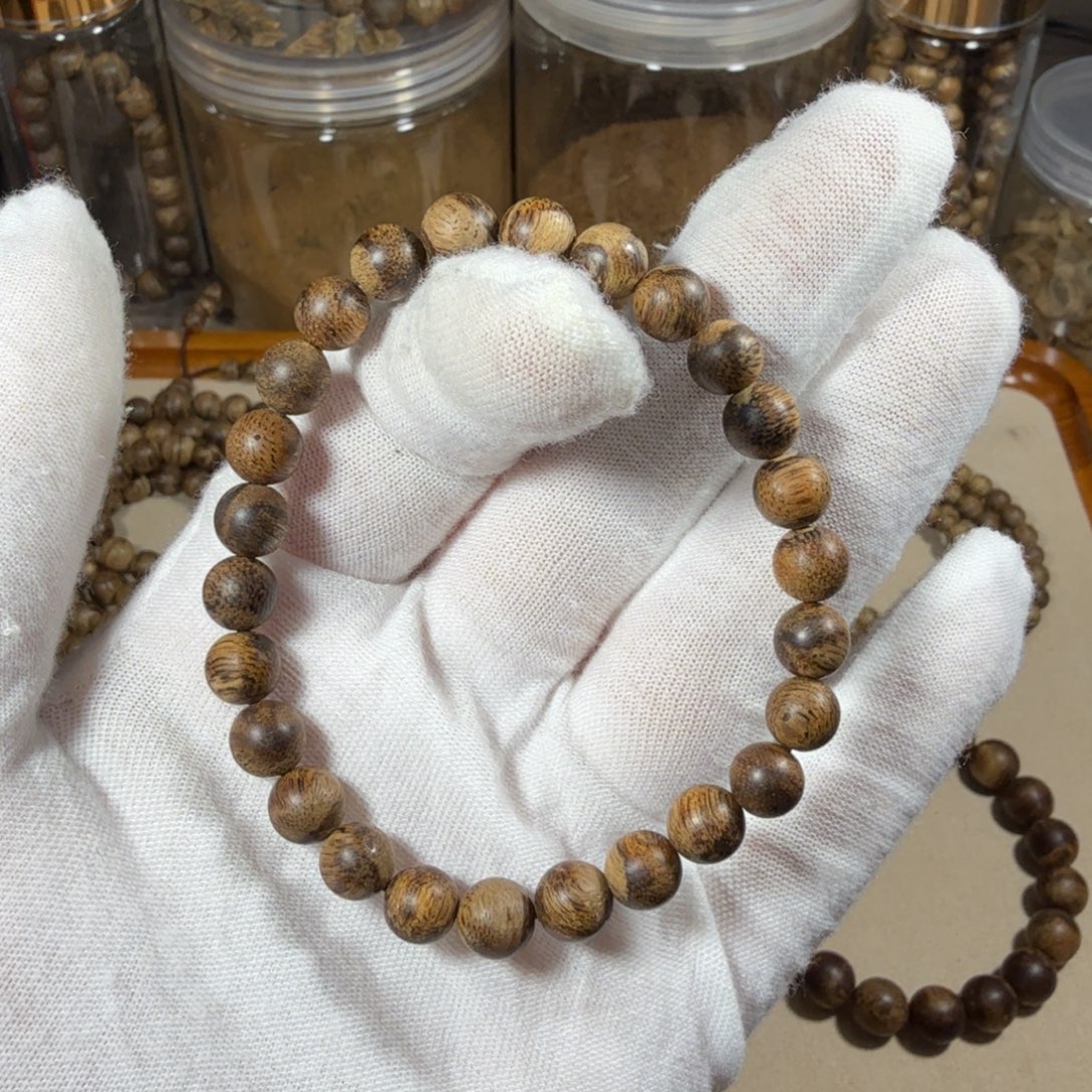 沉香碎屑沉香菩萨棋99分沉5.1克0.7