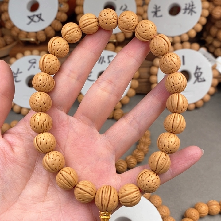 桃核手串金蝉子12.5s抛光尺寸误差0.5之间