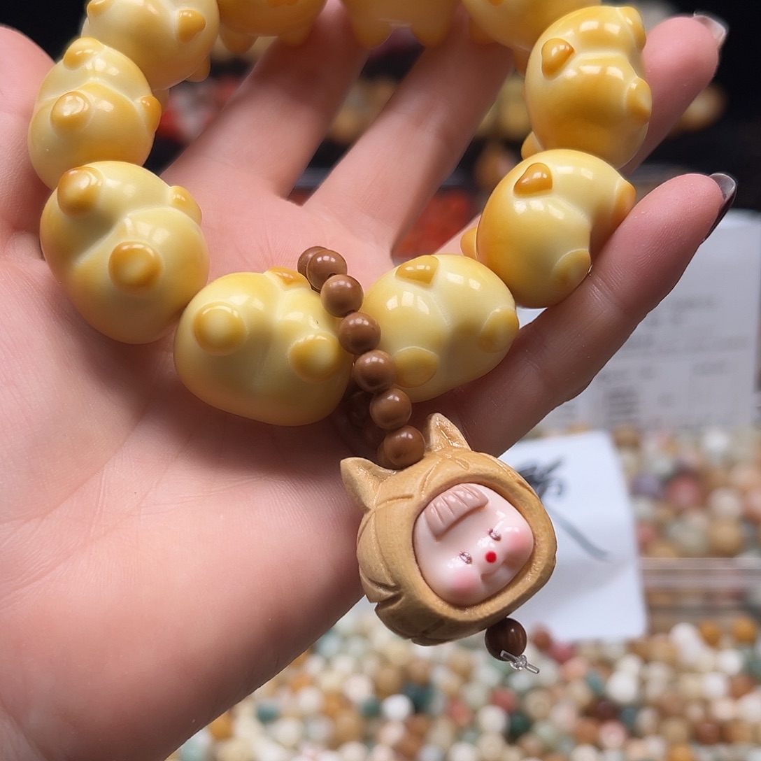 小***洁菩提根/象牙果手串微瑕科机屁屁1条有裂