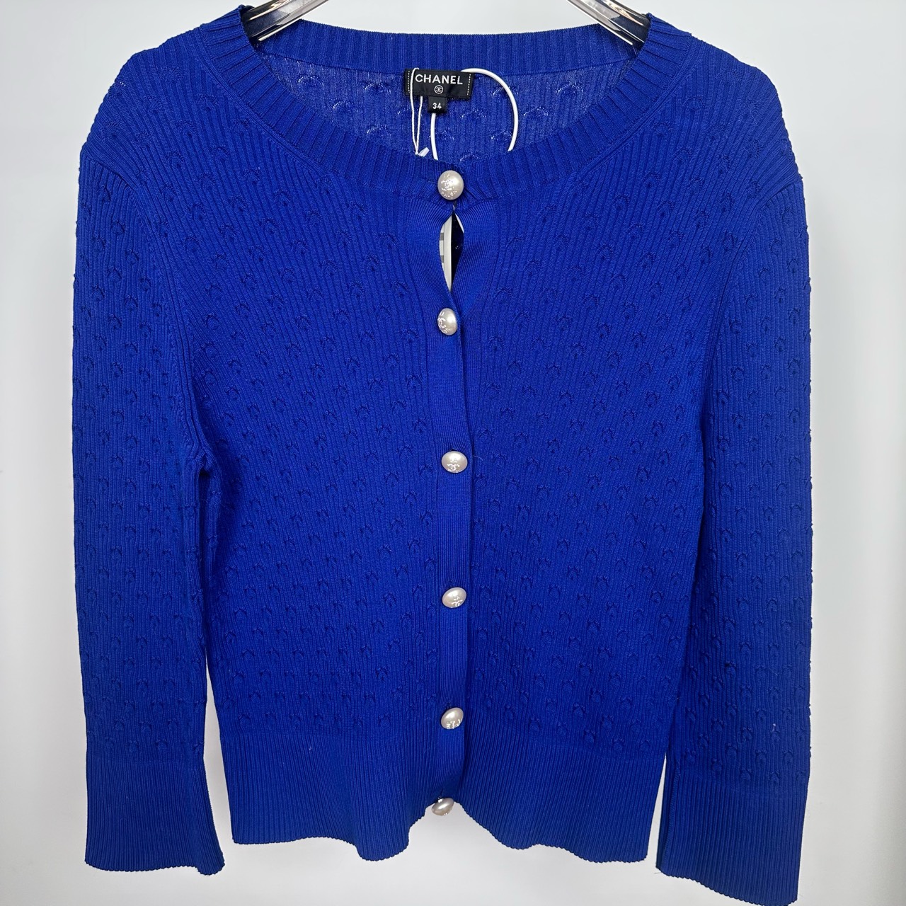 99新 Chanel/香奈儿 克莱因蓝珍珠扣开衫 34码 99新GM003222