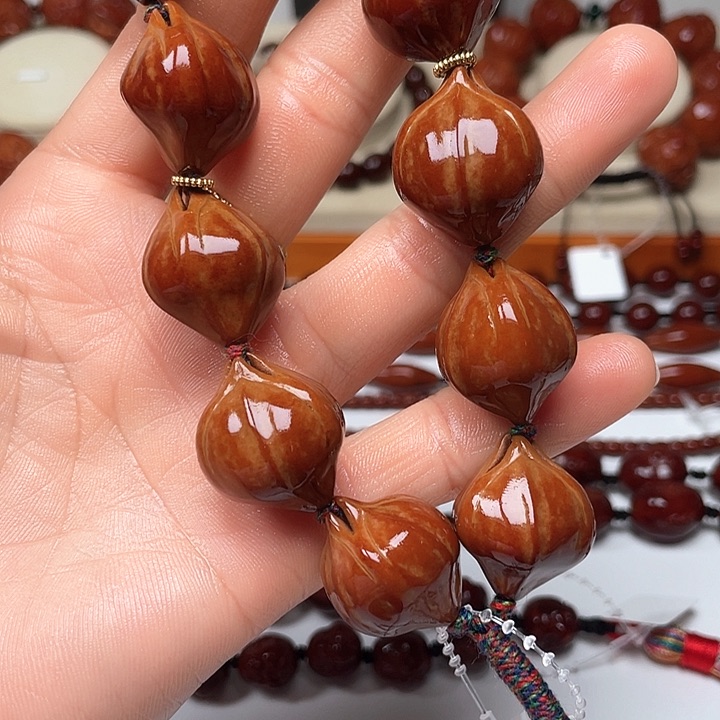 橄榄核手串爷*美玉化素核