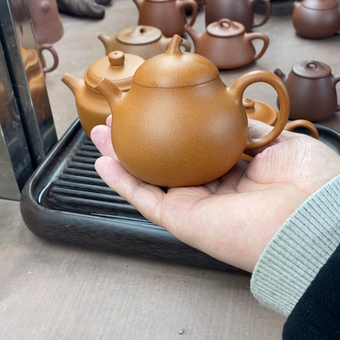 紫砂茶壶花**。紫砂壶茄瓜微瑕