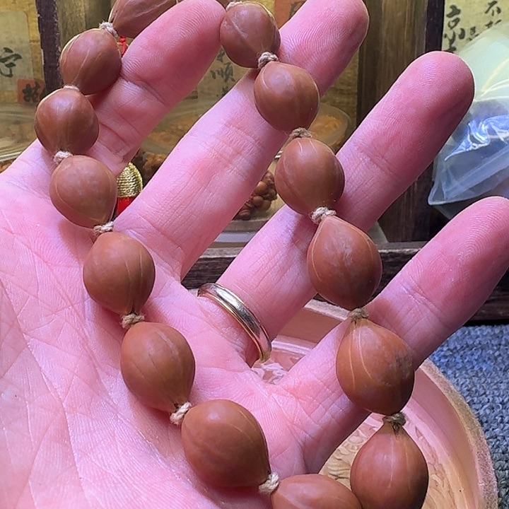 橄榄核吊坠啦啦啦