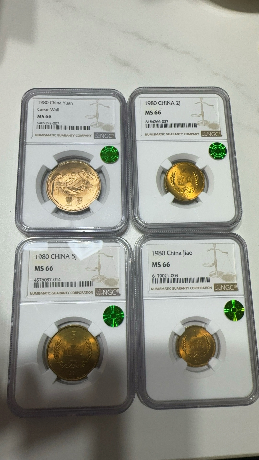 长城币80年卷拆有砖版一套，1元黄金彩，红铜角币，66分同分