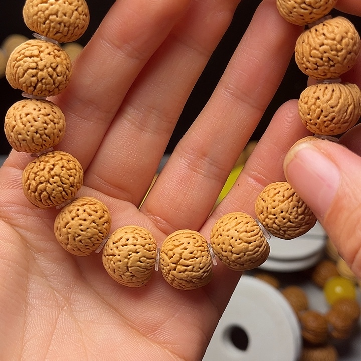 喜***洋桃核吊坠桃核手串