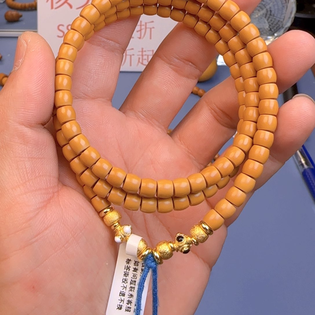 橄榄核手串核尖直切尺寸6.1×120颗ss正三花无白