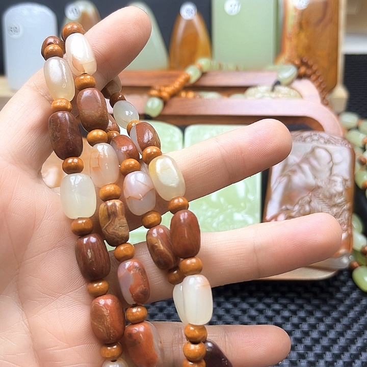 ****࿐非金属红皮珠涟的／