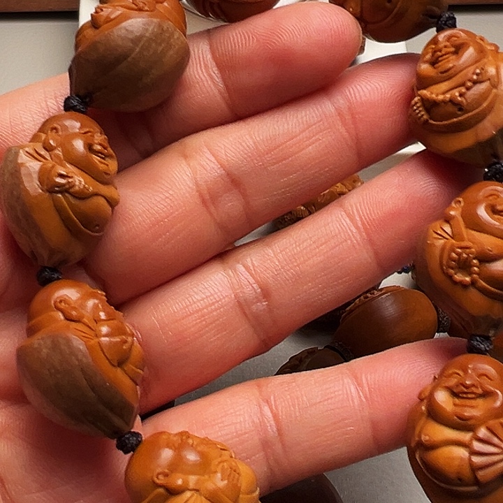 小***狮手串/手链橄榄核包衣弥勒