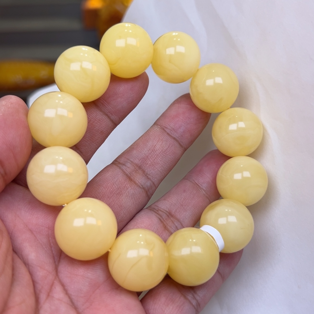 锦***）蜜蜡未镶嵌珠宝奇石19加51.11克