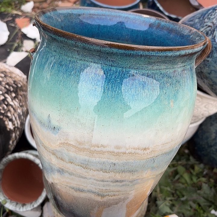 正品紫砂口20高25瑕疵。。。。。。