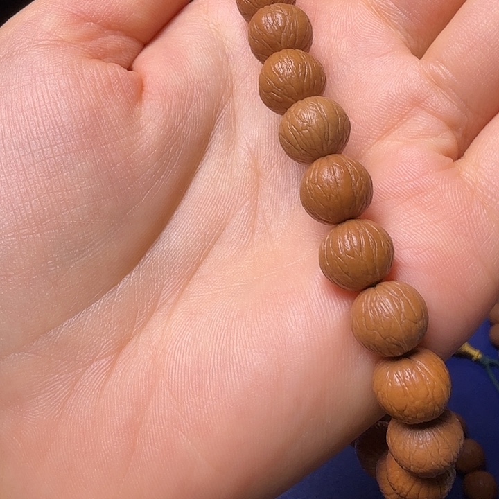 航***舟猴头核桃吊坠凤羽