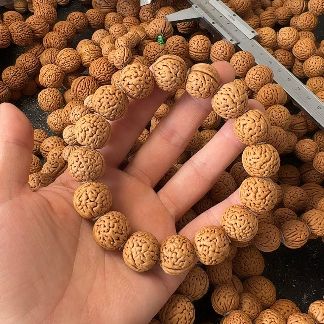 缘***是吊坠桃核野生手串