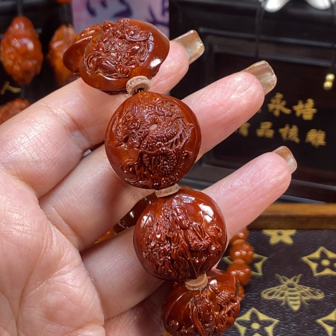 A***丨橄榄核吊坠万佛瑞兽