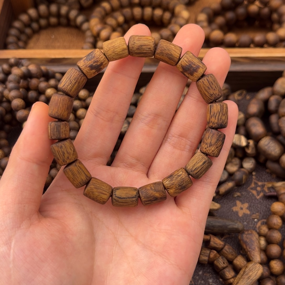 09高山老白棋沉香桶珠单圈7克