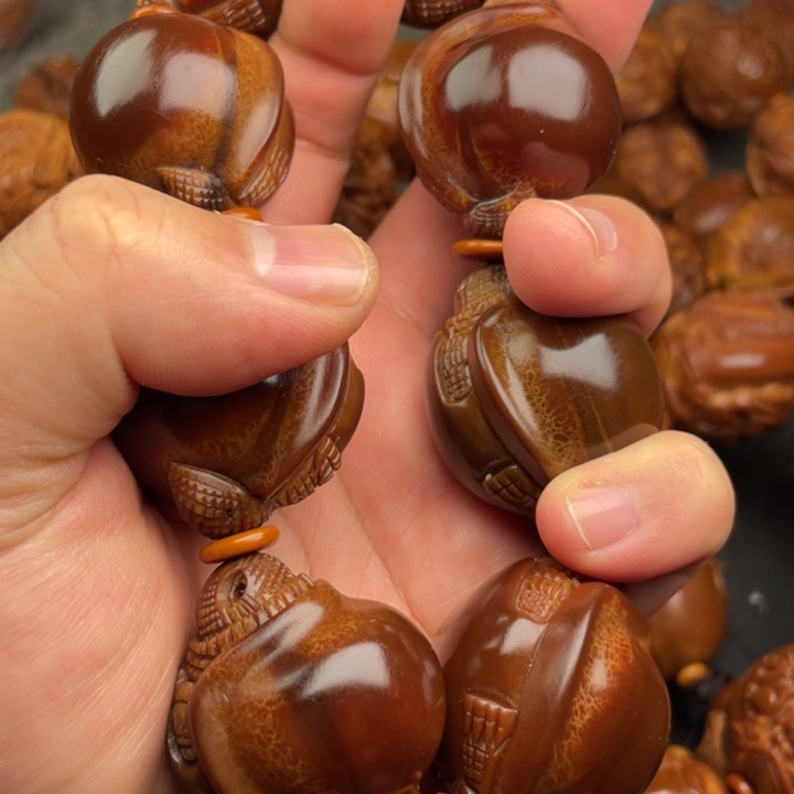 千***回橄榄核吊坠橄榄核