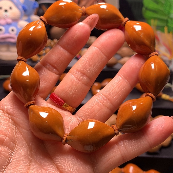 小***嘻手串/手链橄榄核三花手串