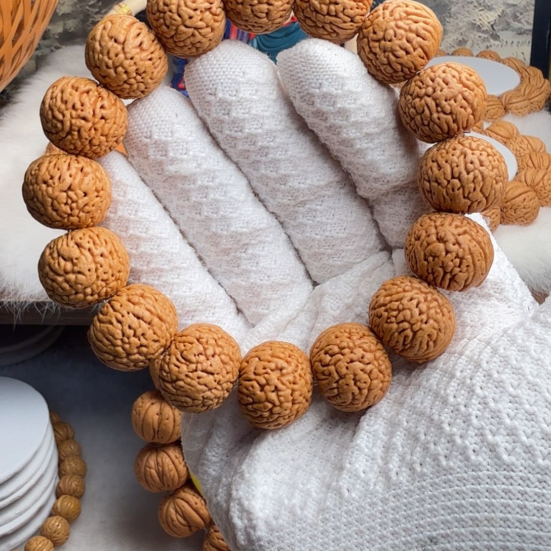 0***.吊坠桃核龙珠手串