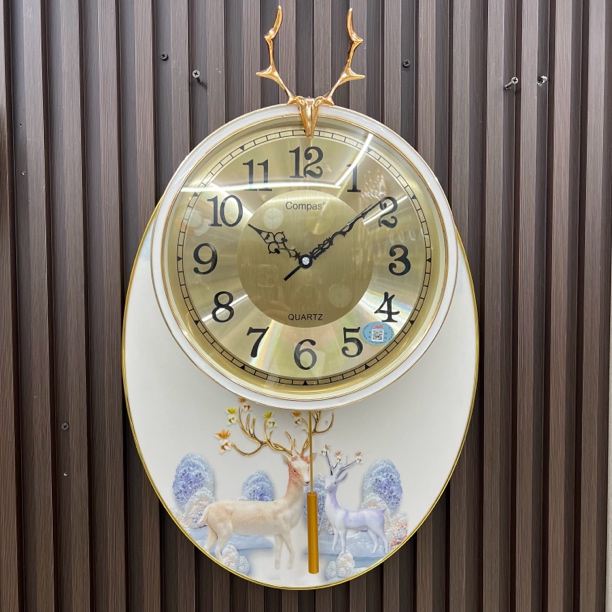 康巴丝摇摆客厅静音钟表福鹿轻奢家用壁挂时钟