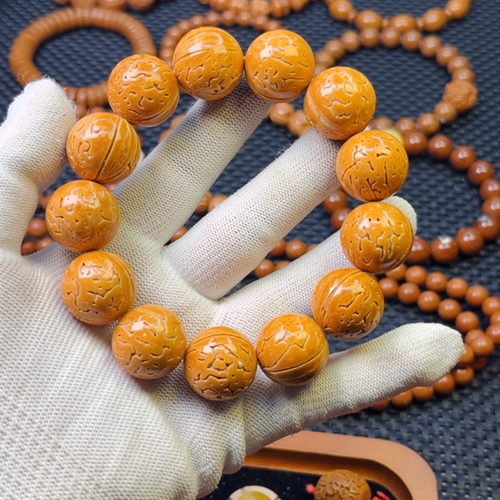 桃核手串歪***、19尺桃核小金豆