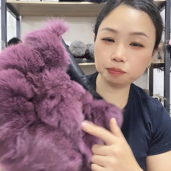 爱***里紫色狐狸毛皮草包