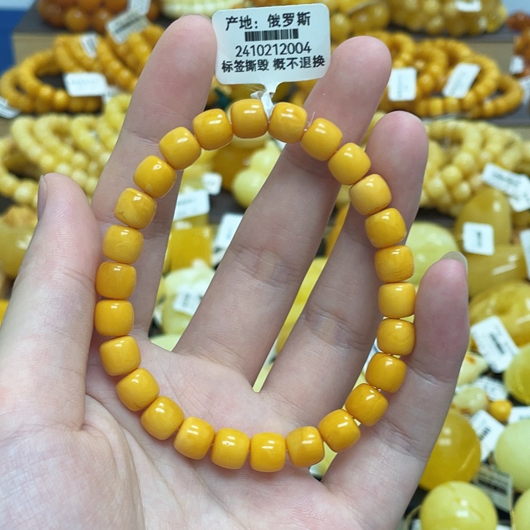 蜜蜡未镶嵌珠宝奇石老型珠鸡油黄满蜡7.8mm瑕