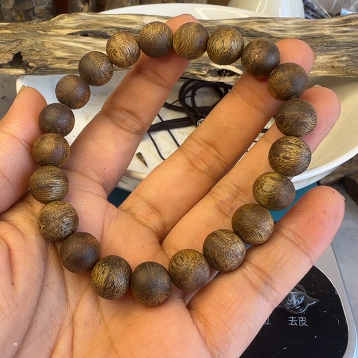 妹***头1.0原木色串串的8.3克