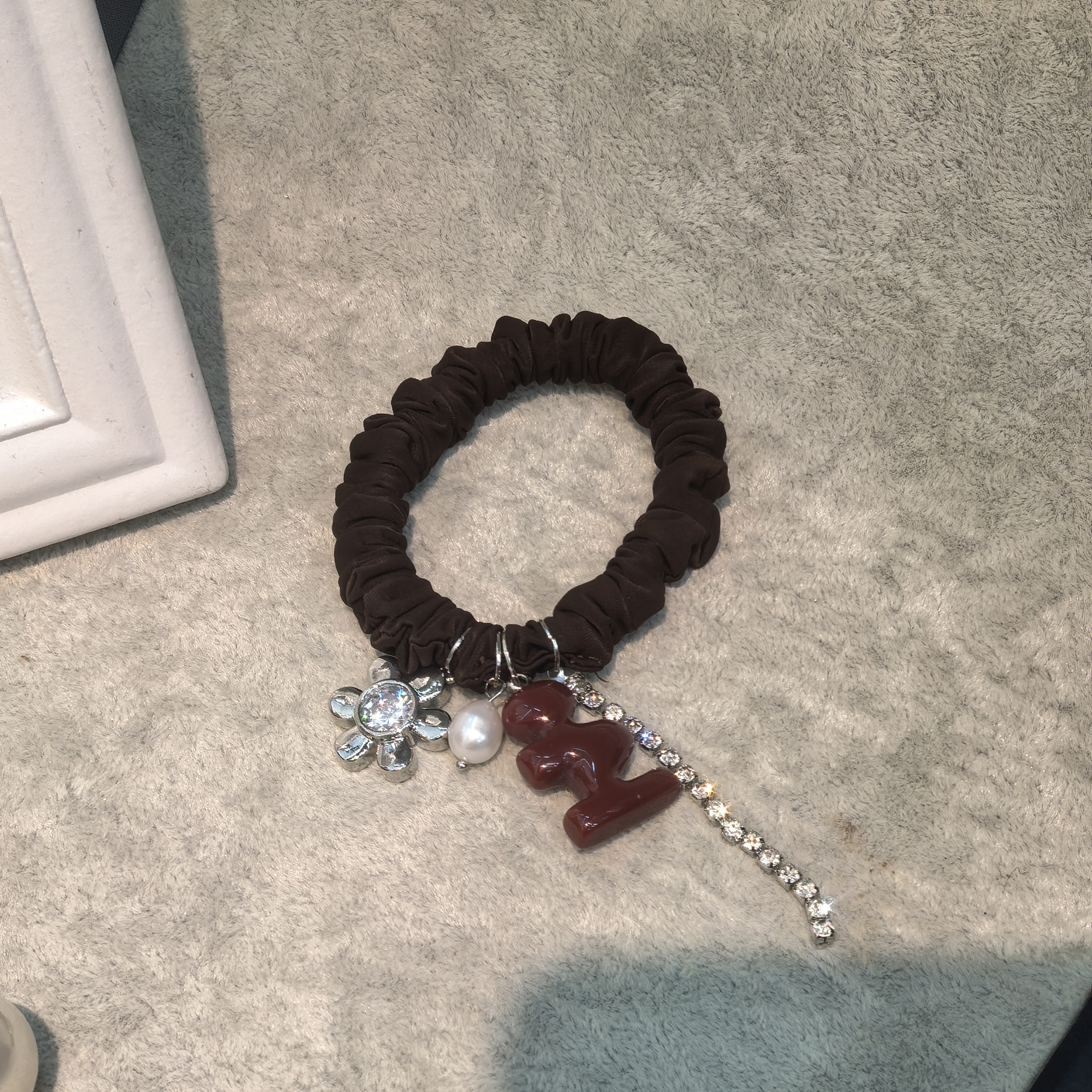 C584黑色太给花朵流苏闪闪小肠圈