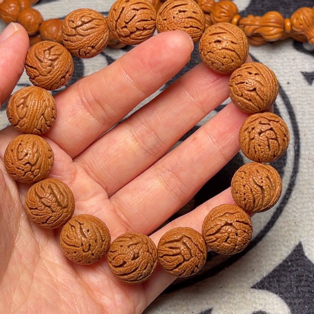 桃核手串龙纹绣球16