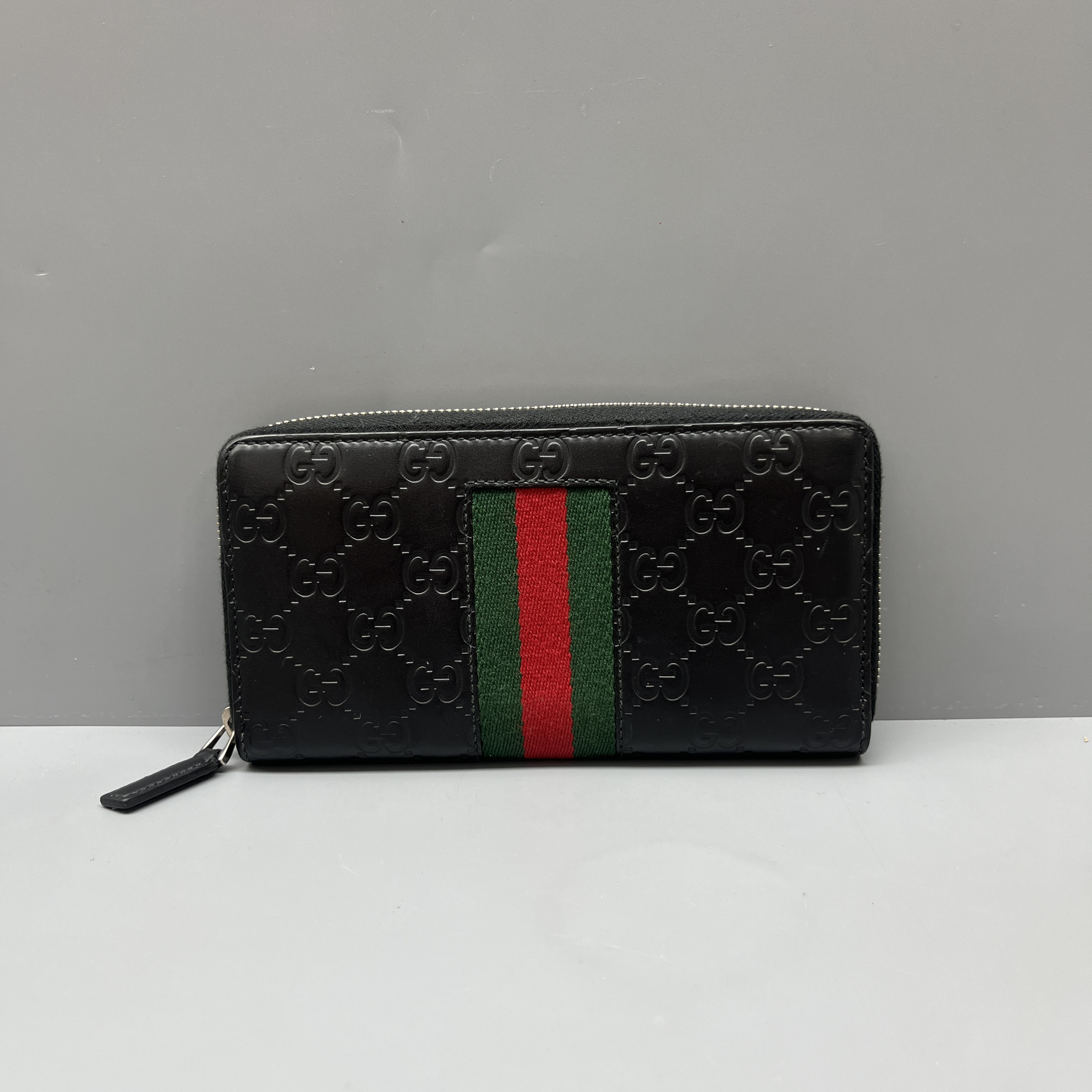 95新 GUCCI/古驰 黑色压花红绿条纹拉链钱包 尺寸19*10 SV16653