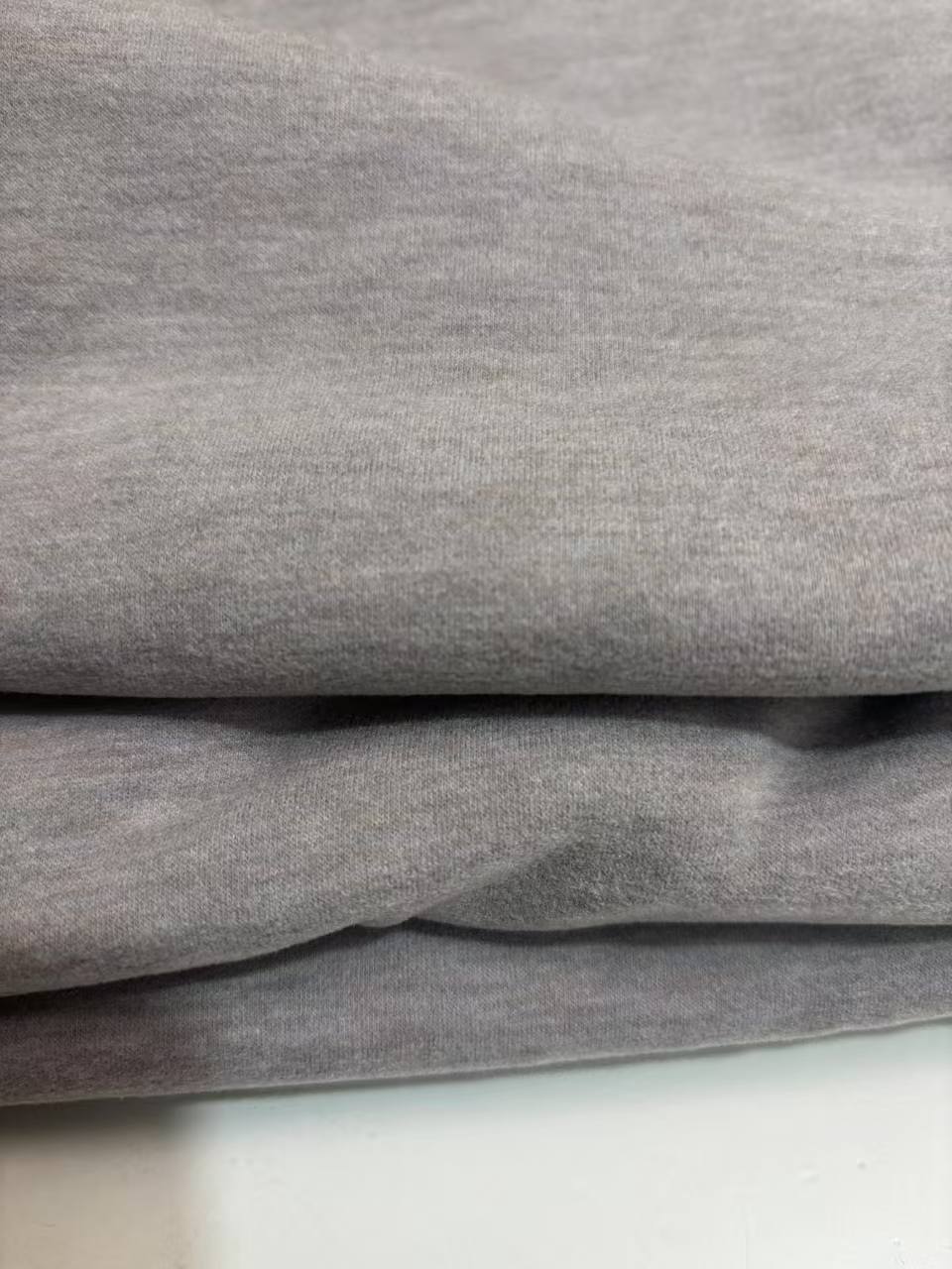 深燕麦炫彩奥绒面料蚕丝羊毛绒布发热保暖家居服打底衫面料