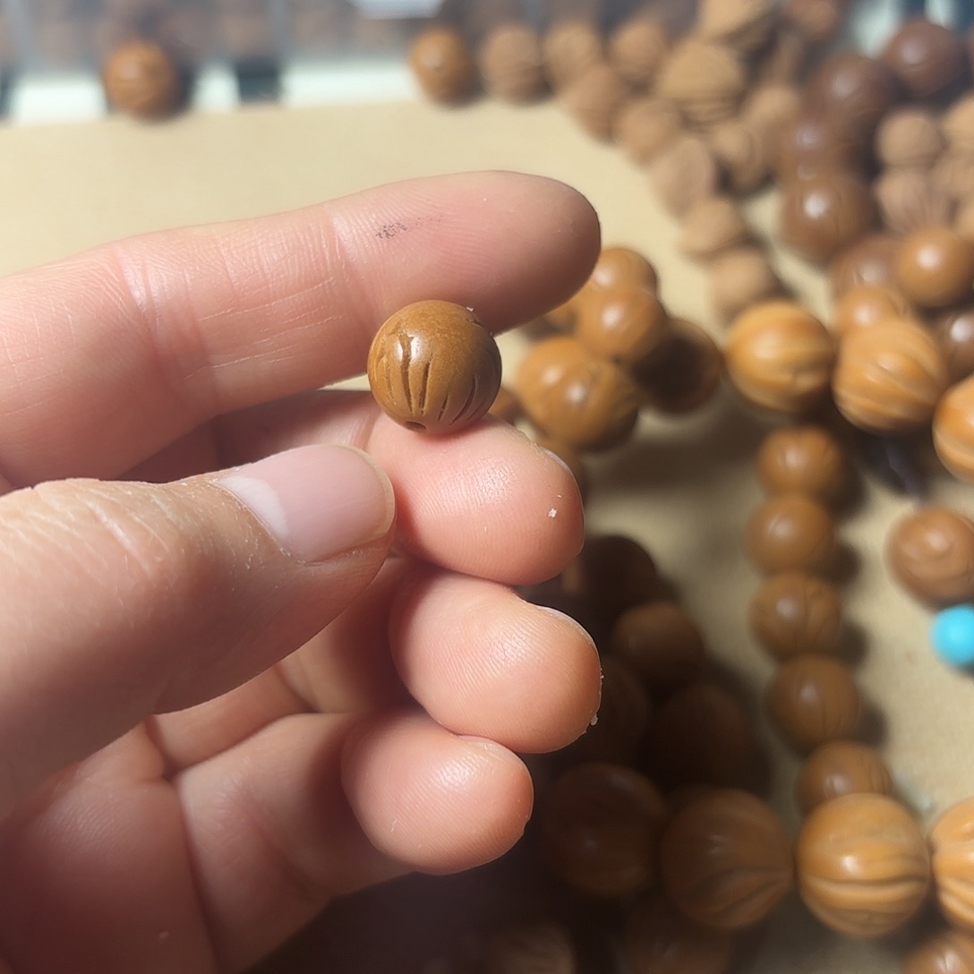 桃核吊坠L**A秦岭龙文光洙1.2尺18颗