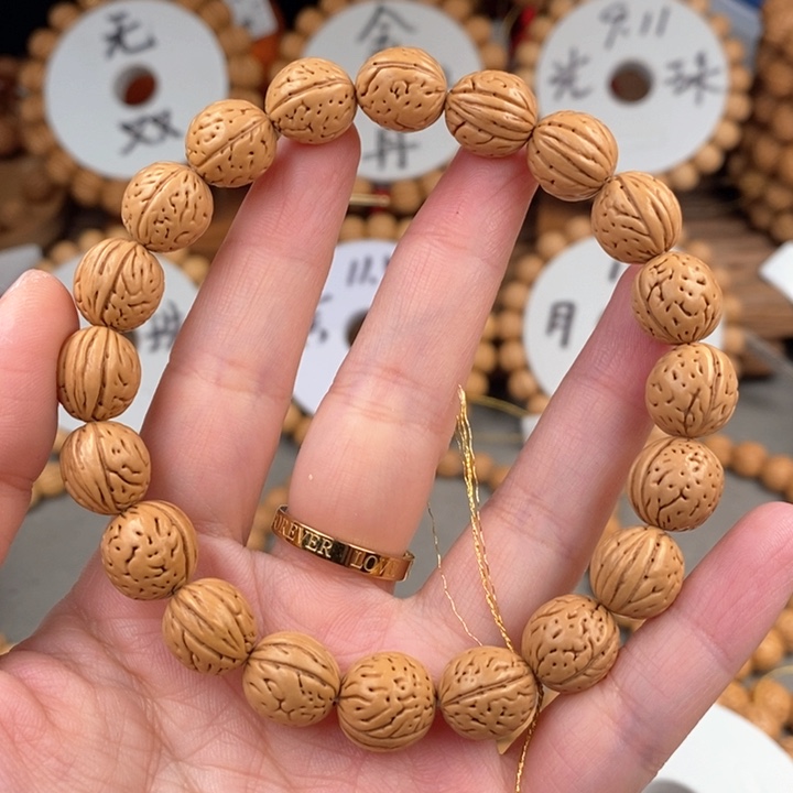 桃核手串凤羽11.5qzzg抛光尺寸误差0.5