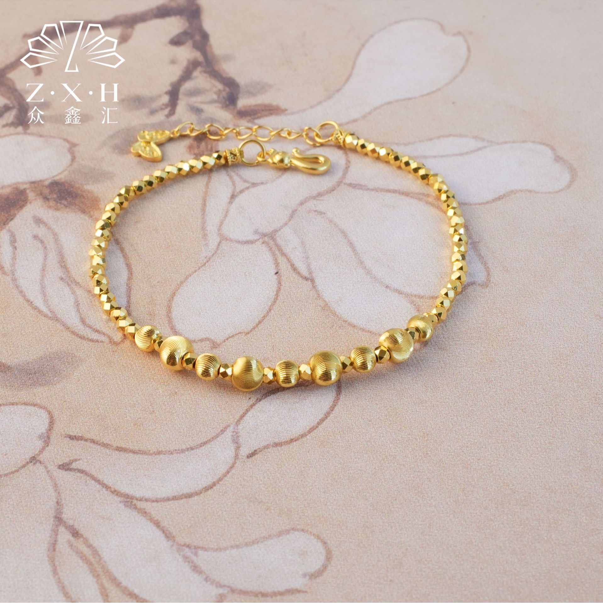 {众鑫汇}足金999 爆闪蹦迪猫眼隔珠手链