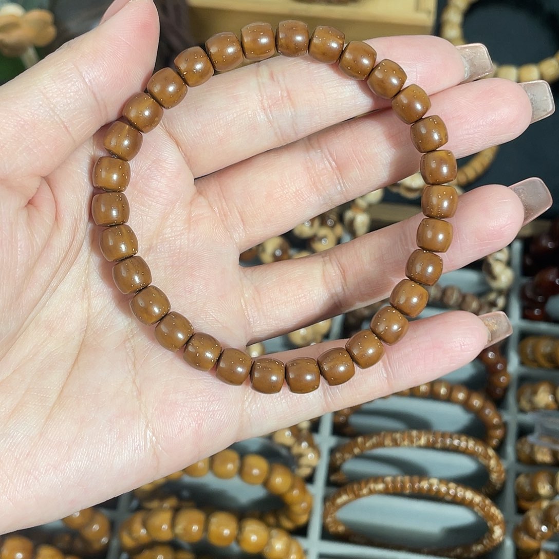 紫金鼠手串7.2*7实心直切极限弧咖皮