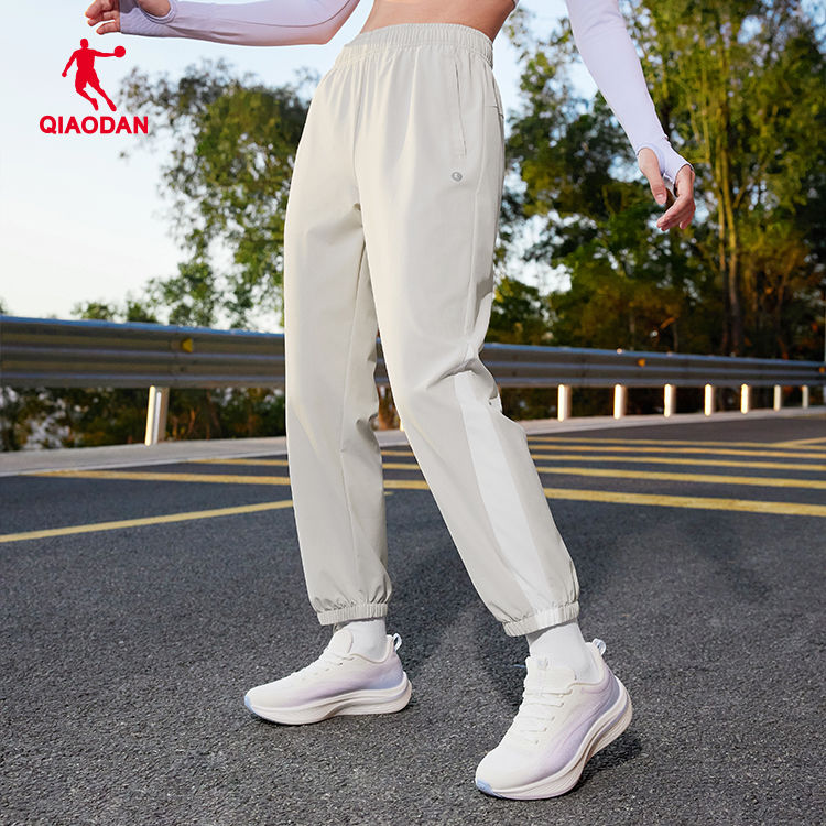 乔丹女性梭织长裤薄款束脚裤2025秋季专业运动跑步裤QDBYK2252441