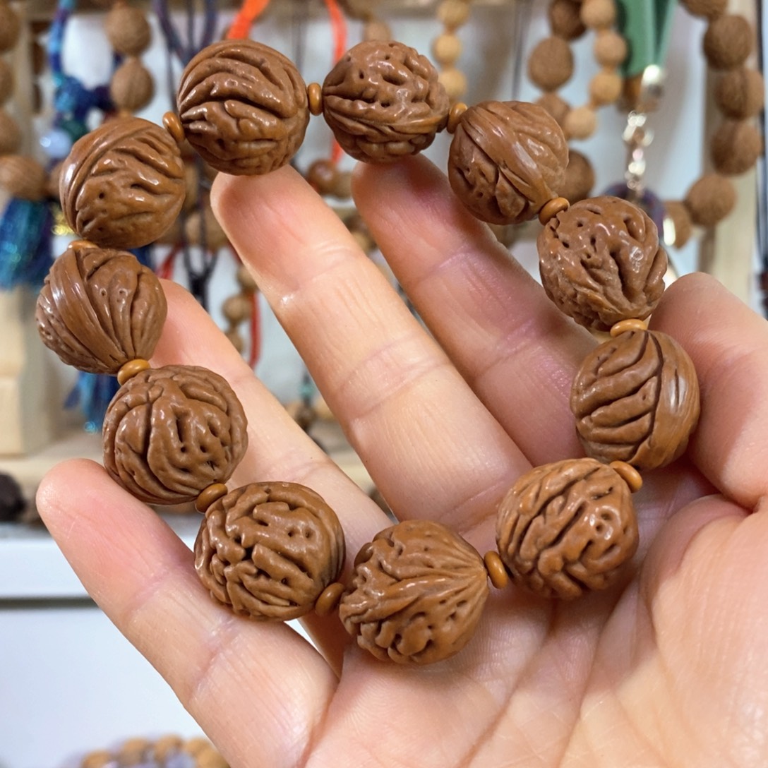 菡***开手串桃核11111111111