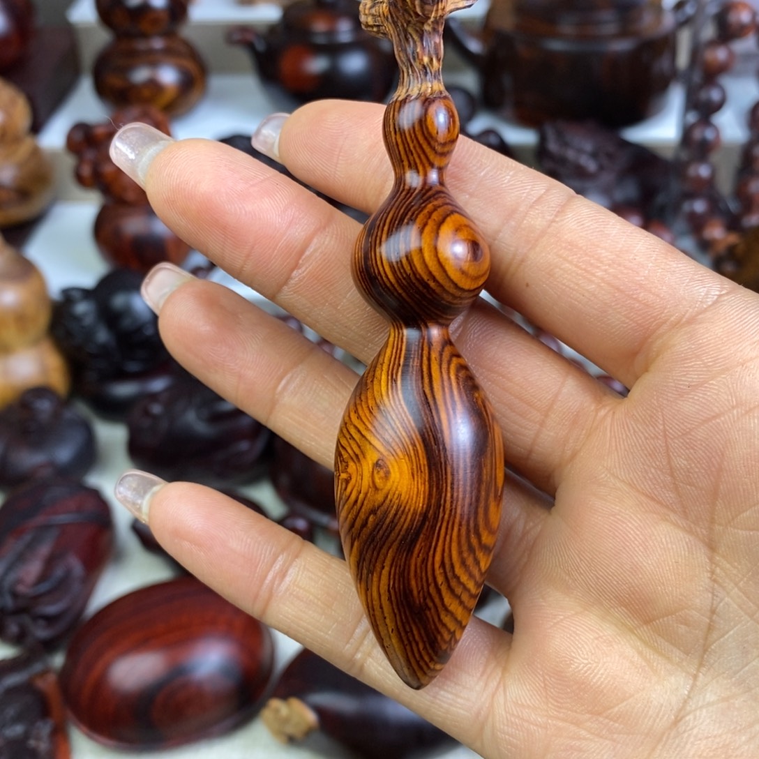 木微凹黄檀蚂蚁葫芦手把件