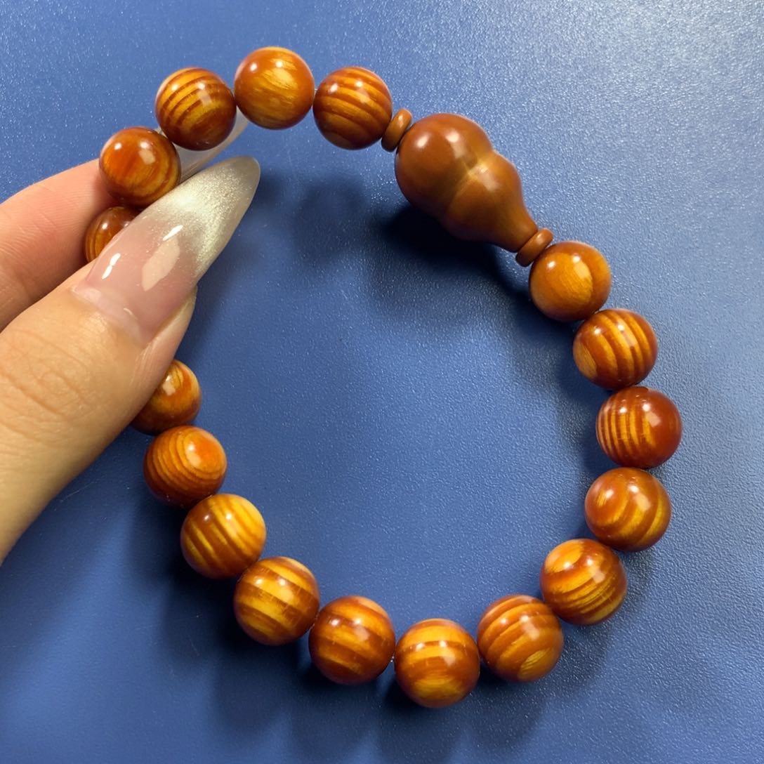 松木达**咩琥珀木1.1