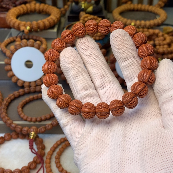 用***8桃核手串秦岭龙纹